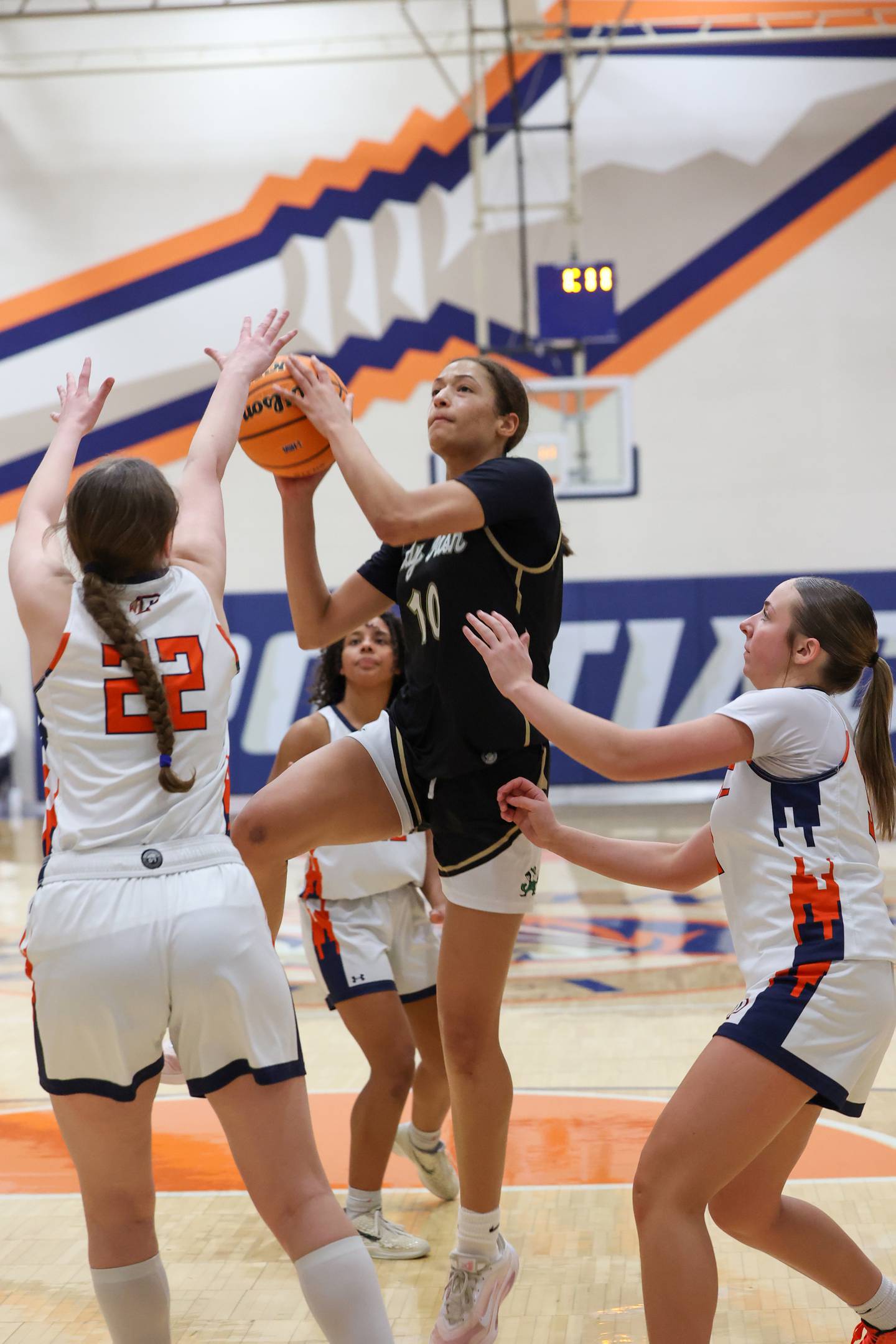 Bishop McNamara’s Trinitee Thompson approaches the basket during the Fightin’ Irish’s 46-32 loss to Pontiac in the IHSA Class 2A Pontiac Sectional semifinal on Tuesday, Feb. 24, 2026, at Pontiac Township High School.
