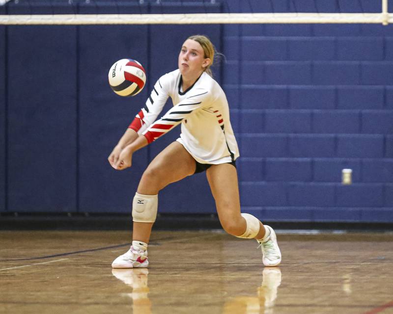 Yorkville's Audrey Knoll (3) digs the ball during volleyball match between Yorkville at Oswego. Sept 23, 2025.