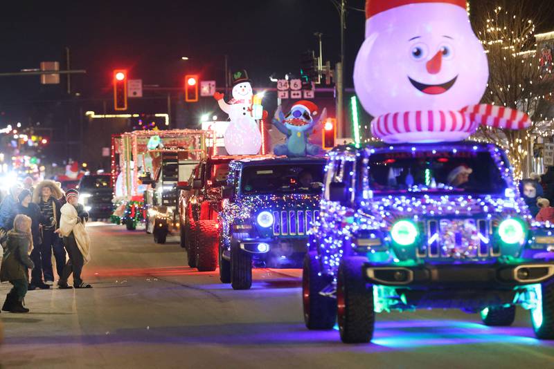 The "Night of Lights" parade strolls down Main Street on Friday, Dec. 5, 2025 downtown Princeton. The event featured the Christmas tree lighting at Veterans Park a lighted Christmas parade down Main Street,  Living Windows, a Candy Cane Hunt, and visits with Santa.