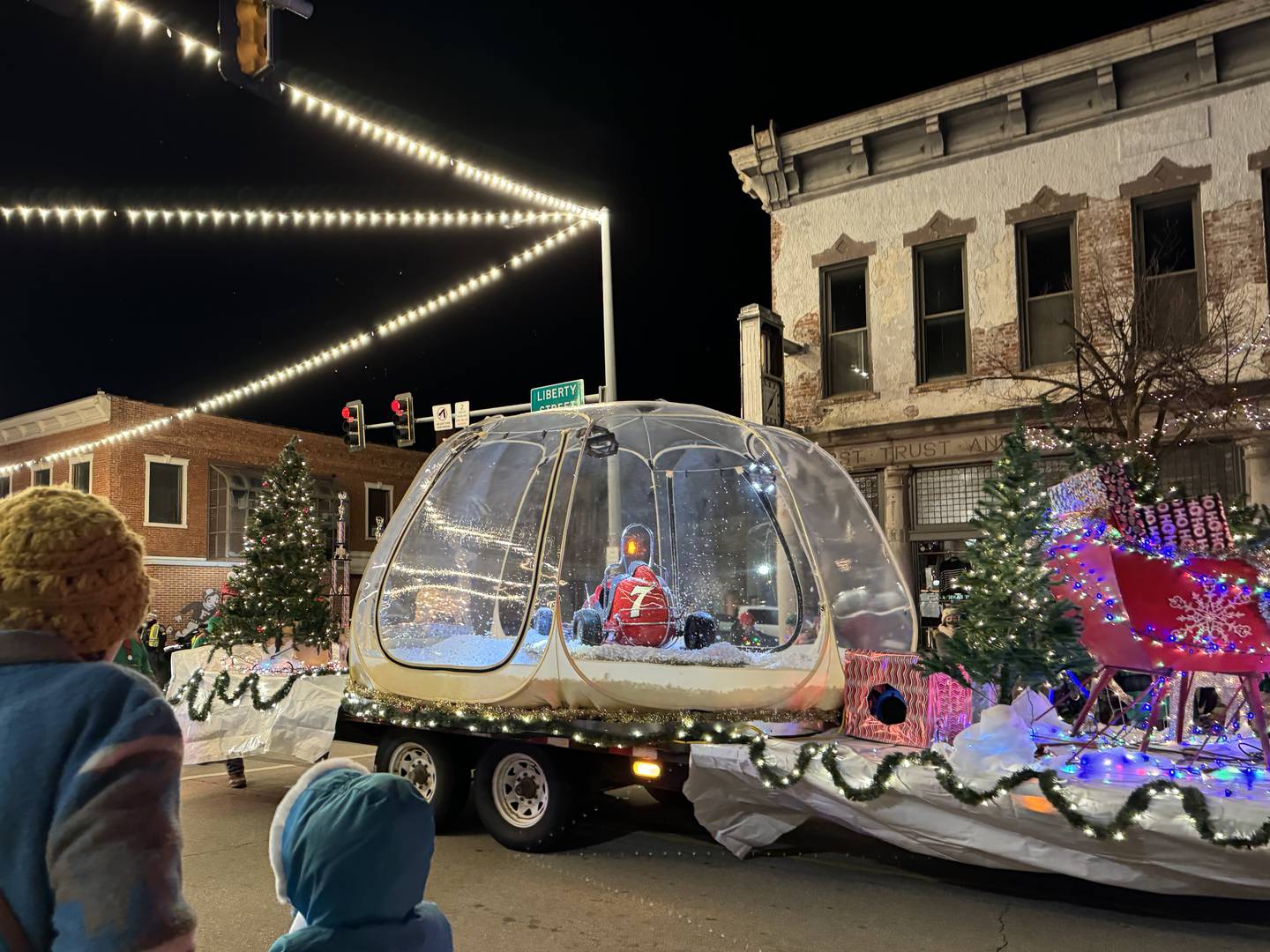 Morris Cruise Night had a truck pulling a giant snow globe during the Morris Home for the Holiday parade.