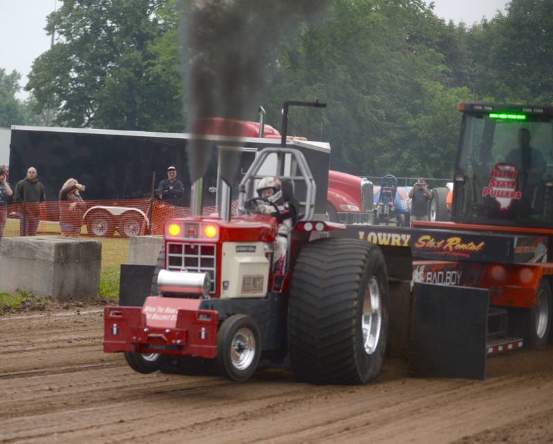 Craig Harrison of Shabbona drives his tractor "Inches Matter" at the Forreston FFA Alumni Tractor and Truck Pull held during Leaf River Daze in Leaf River on Saturday, June 7, 2025.. He pulled 286.24' in this attempt.