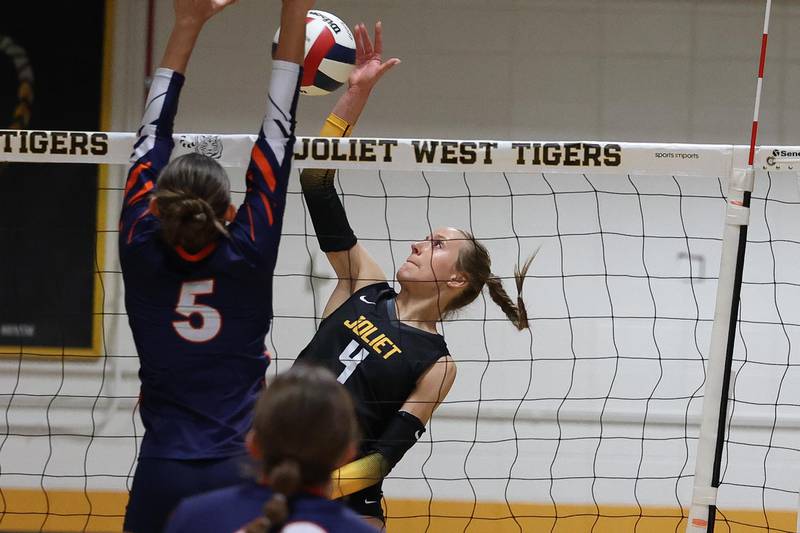 Joliet West’s Lina Govoni goes for the kill against Romeoville on Thursday, Sept. 5, 2024 in Joliet.