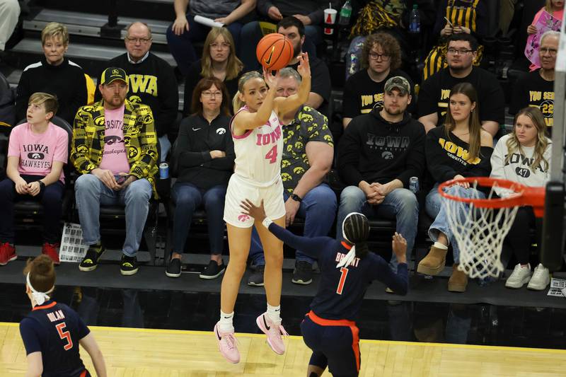 Iowa Hawkeyes guard Kylie Feuerbach (4) shoots a 3-pointer during their game against Illinois at Carver-Hawkeye Arena in Iowa City, Iowa, on Sunday, February 25, 2024. (Jerod Ringwald/hawkeyesports.com)