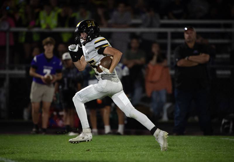 Herscher's Mason Roberts makes a pick off and returns it for a touchdown against Manteno on Friday, September 12, 2025.