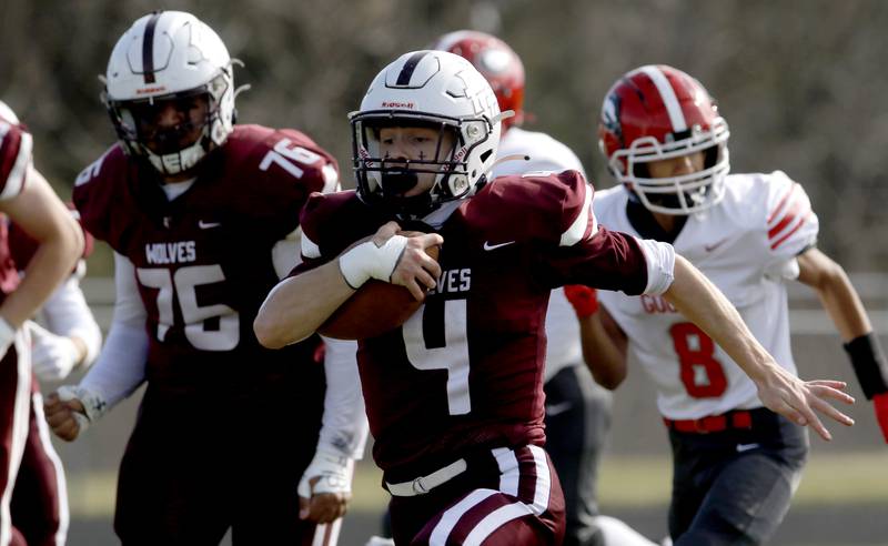 Prairie Ridge's Jack Finn runs through the Chicago Goode defense to score the his first touchdown during an IHSA Class 5A first-round football game on Saturday, Nov. 2, 2024, at Prairie Ridge High School in Crystal Lake.