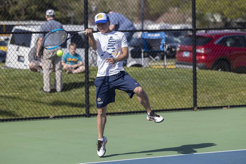 Sterling’s Connor Pham plays a shot in his doubles match against Dixon Thursday, May 4, 2023.