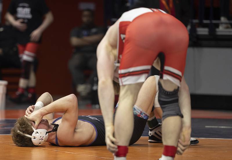 Dixon’s Charlie Connors reacts to losing the 144 pound title to Garrett VerHeecks of Unity Christian Saturday, Feb. 21, 2026, at the IHSA wrestling finals in Champaign.