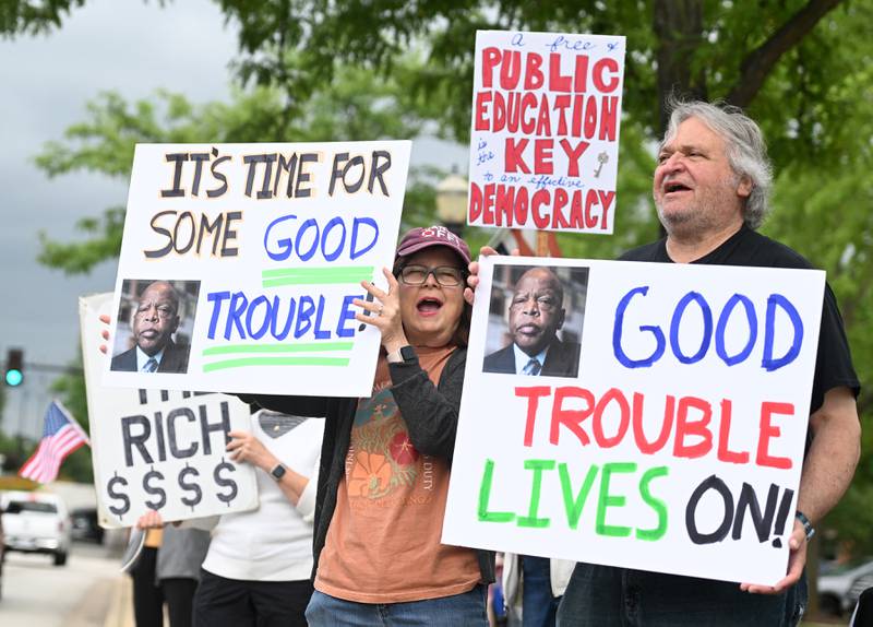 Janet and John Vercelli of Elgin said the "Good Trouble Lives On" protest in Elgin Thursday was the 12th protest they've joined in the past few months. .