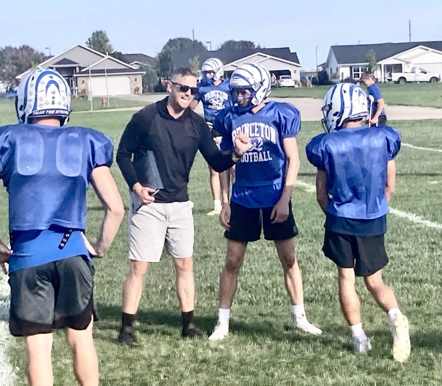 Patrick Smith, defensive backs coach, makes a point during Thursday's practice. He was a standout receiver on Bureau Valley's state runner-up and state champion teams in 2004 and 2005.