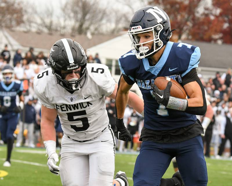 Nazareth Academy's Jake Cestone (7) runs the ball for some yards before being brought down by Fenwick's Mike Muprhy (5) during the 6A semifinals game on Saturday Nov. 22, 2025, held at Nazareth Academy High School in La Grange Park.