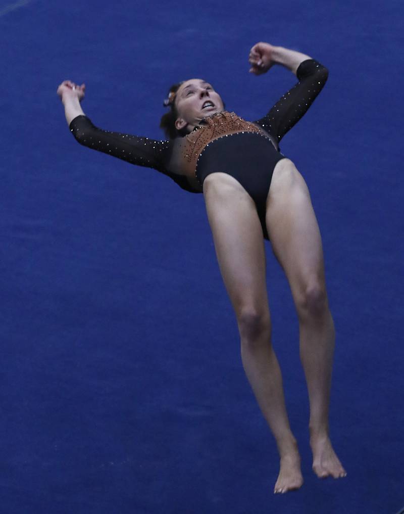 Libertyville’s Anna Becker competes in the preliminary round of the floor exercise Friday, Feb. 17, 2023, during the IHSA Girls State Final Gymnastics Meet at Palatine High School.