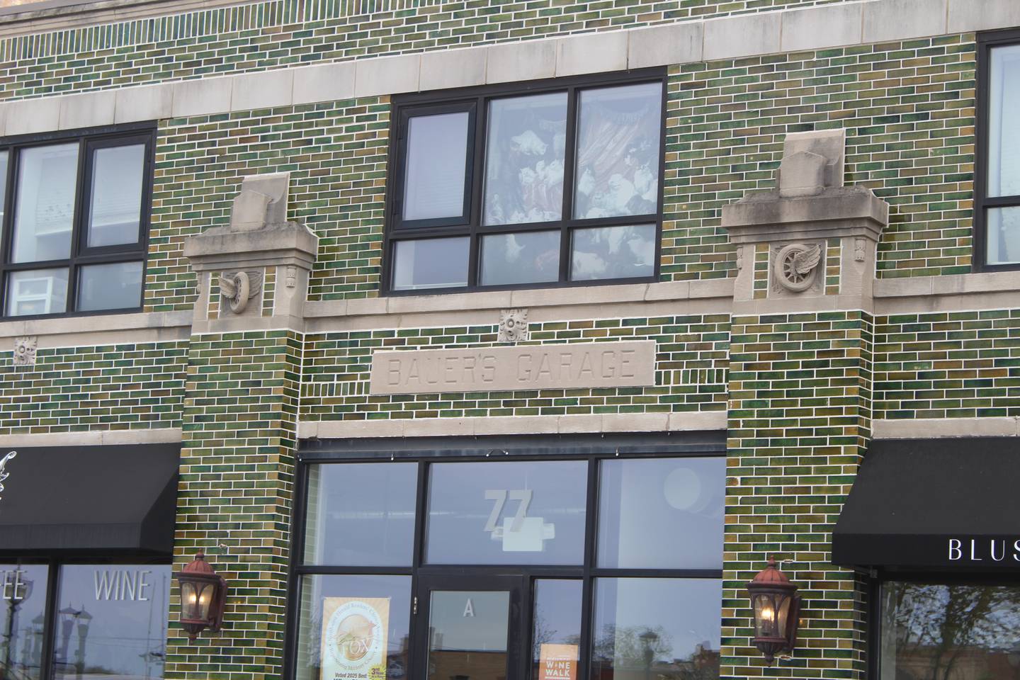 The downtown Crystal Lake building at 77 E. Woodstock St. has the words "Bauer's Garage" still etched in stone.