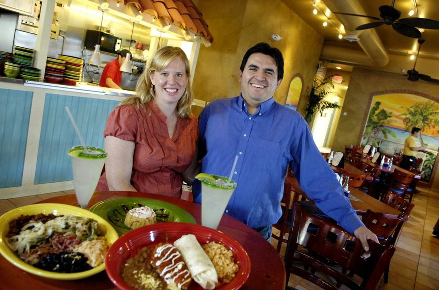 Sergio and Lindsey De Los Santos are pictured months after the opening of Sergio's Cantina in Geneva in 2008.