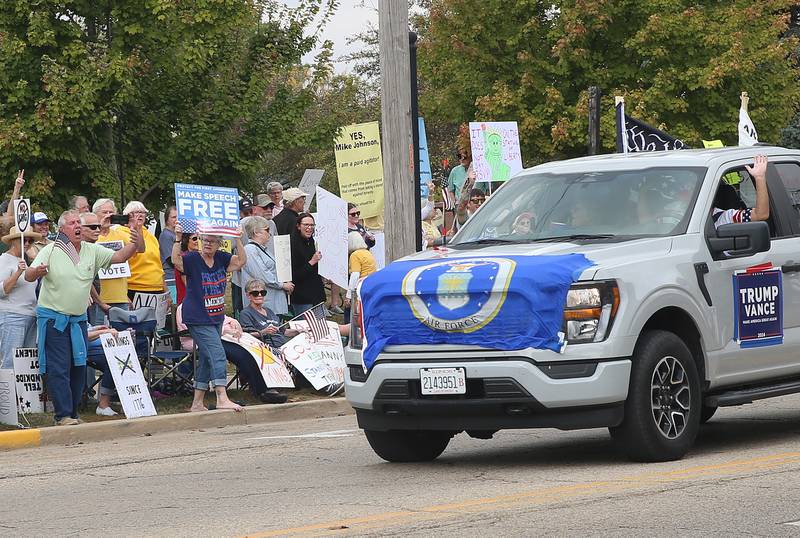 Protesters yell at a Trump supporter while driving past Rotary Park during the No Kings protest on Saturday, Oct. 18, 2025 in Princeton.