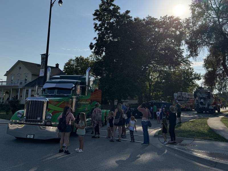 Kids lineup for the Touch-a-Truck during Coal City Fall Fest 2025 on Saturday, Sept. 13, 2025.