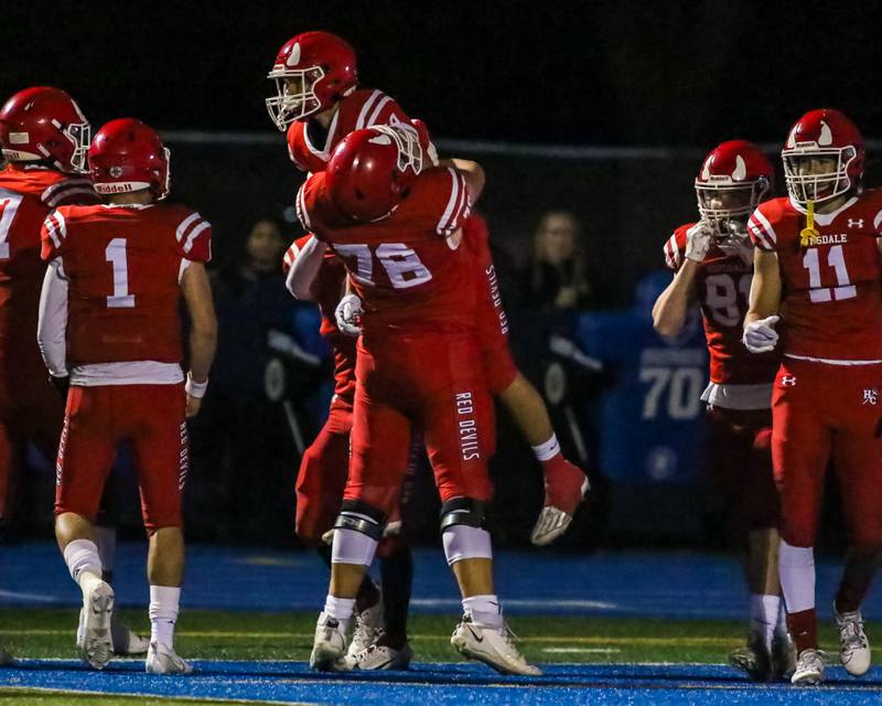 Hinsdale Central's Jack Walsh (19) celebrates a touchdown run after reception during football game between Hinsdale Central at Lyons.  Sept 8, 2023.
