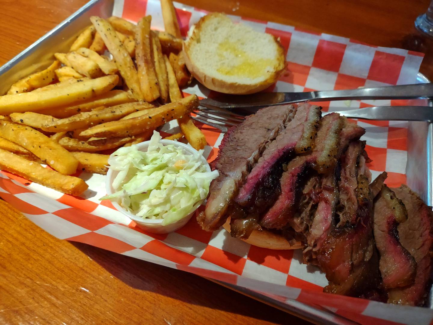 The headliner of the barbecue sandwich menu at No. 4 Social Garage in Seneca is the smoked beef brisket sandwich.