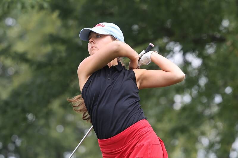 Ottawa’s Caroline Conney hits a shot off the 11th hole tee in the Class 2A Bradley Regionals at the Green Garden Country Club in Frankfort on Thursday, Sept. 28, 2023.