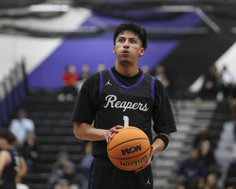 Plano's Alan Contreras (1) takes a breath before shooting a key free throw down the stretch of their Plano Christmas Classic basketball game between Streator at Plano Friday, Dec 26, 2025 in Plano.