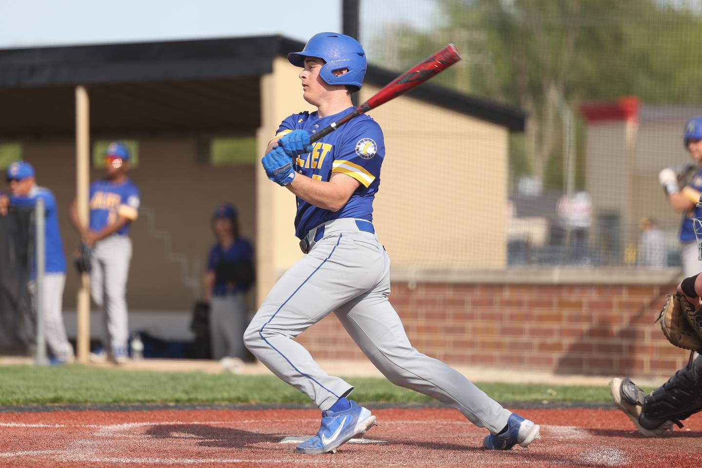 Joliet Central’s Robert Fitzpatrick singles against Joliet West on Tuesday, May 9, 2023 in Joliet.