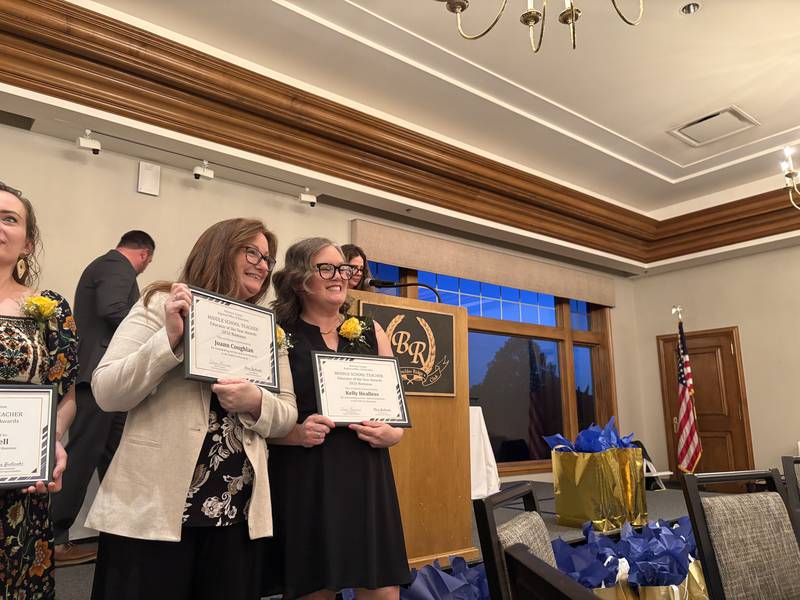 Middle School Teacher award nominees Joann Coughlan, left, and Kelly Healless pose with their certificates at the McHenry County Educator of the Year ceremony in Lake in the Hills, Saturday, May 9, 2026.