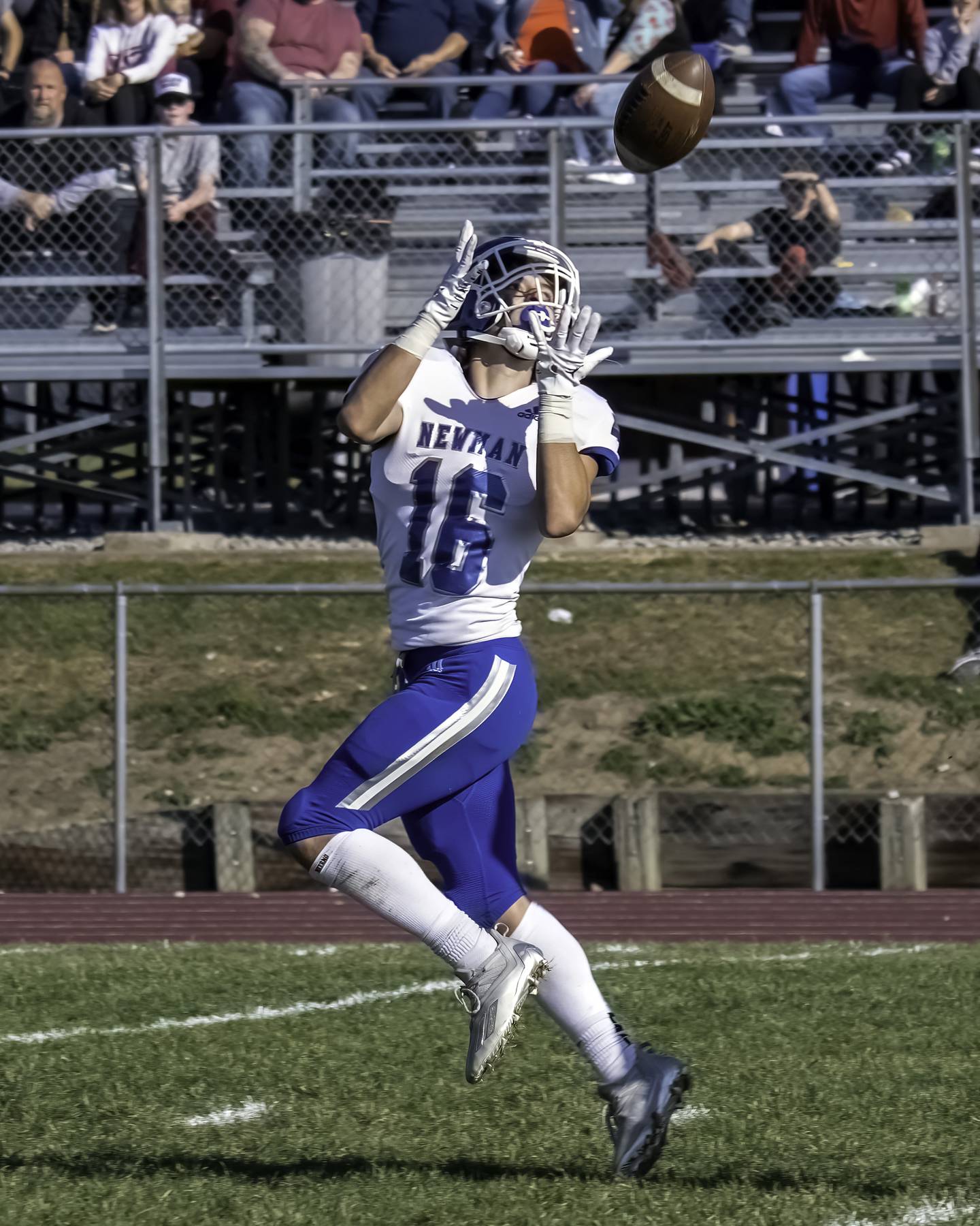 Newman's Ayden Batten hauls in a touchdown catch Saturday during a Class 2A first-round playoff game against Rockridge.