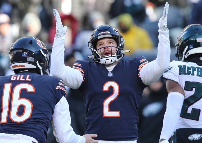 Chicago Bears place kicker Cairo Santos gestures sarcastically after making an extra point having missed a previous kick during their game against the Eagles Sunday, Dec. 18, 2022, at Soldier Field in Chicago.