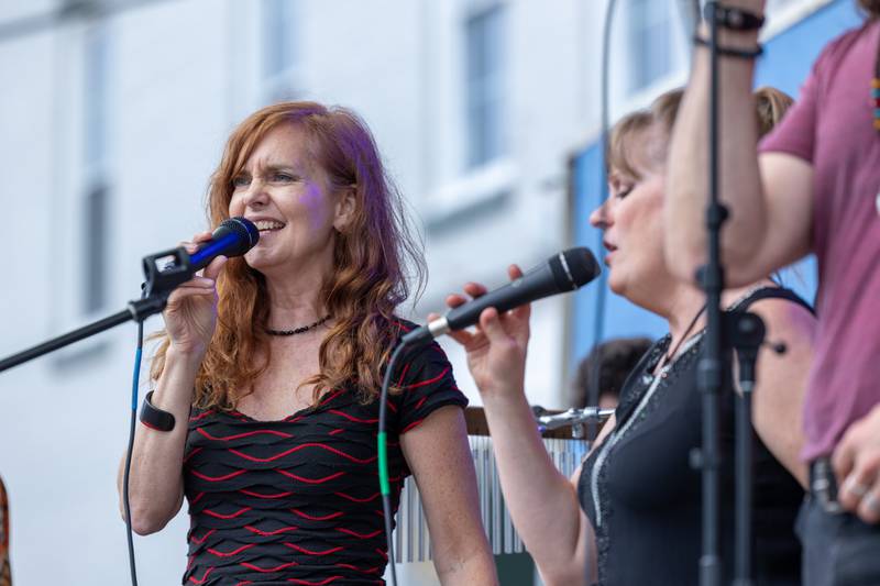 (left to right) Julie Leuck and Paula Mcevers of “Brass From The Past” sing at the annual Shrimp Fest on Saturday, June 7, 2025 at Rotary Park in Princeton.