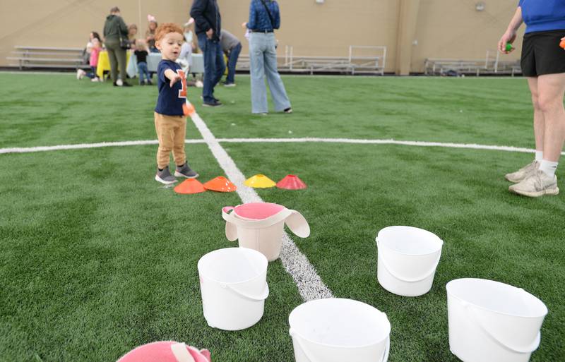 Clark Thurman of Glen Ellyn participates in one of the games during the Glen Ellyn Park District's Hoppy party Saturday, March 30, 2024.