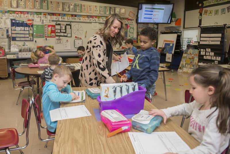 Special Ed teacher Amber Bianchi work with students in Melissa Heaton's kindergarten class at Sterling's Jefferson School.