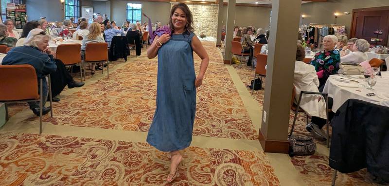 Resource Bank Bethany branch manager Tho Pham modeling at the Resource Bank Classics Club's Ladies Night out event