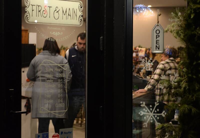 Gary Ludwig serves up a meatball sandwich during Forreston's Christmas in the Country on Friday, Dec. 1, 2023. Shopping was one of the activities held on a snowy night in downtown Forreston.