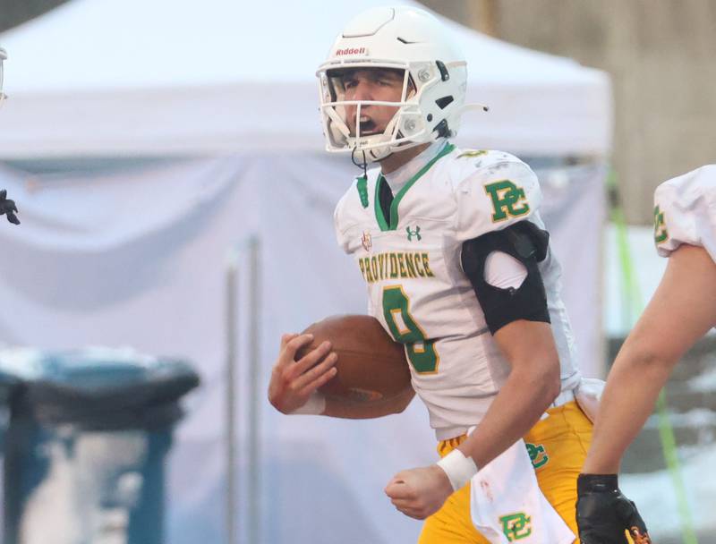 Providence Catholic quarterback Dominic Vita reacts after scoring a touchdown during the Class 5A State championship on Tuesday, Dec. 2, 2025 in Hancock Stadium at Illinois State University in Normal.