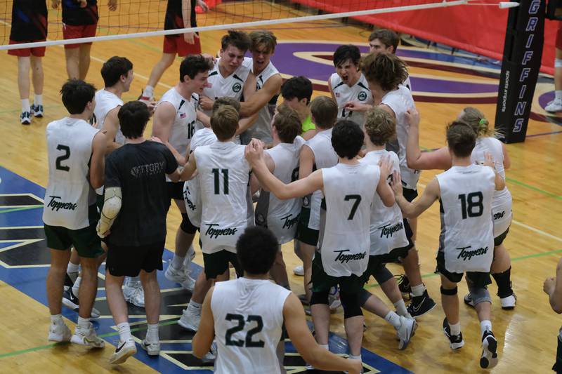 Glenbard West celebrates a 2 set win over Roncalli (IN) in the Lincoln-Way East Tournament title match. Saturday, April 30, 2022, in Frankfort.