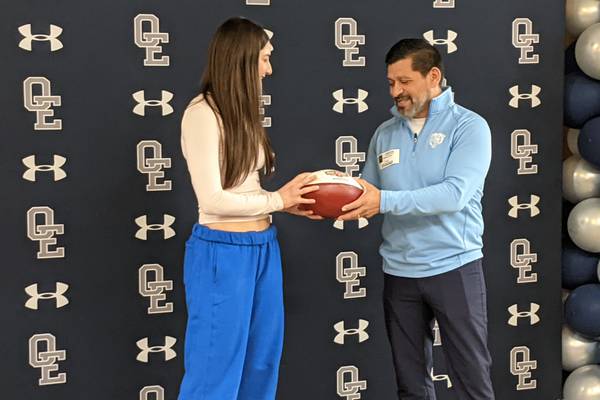Chicago Bears present Oswego East’s flag football quarterback with community award
