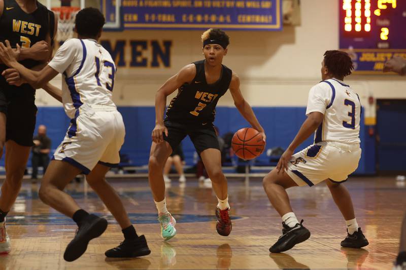 Joliet West’s Jeremiah Fears looks for a play against Joliet Central.