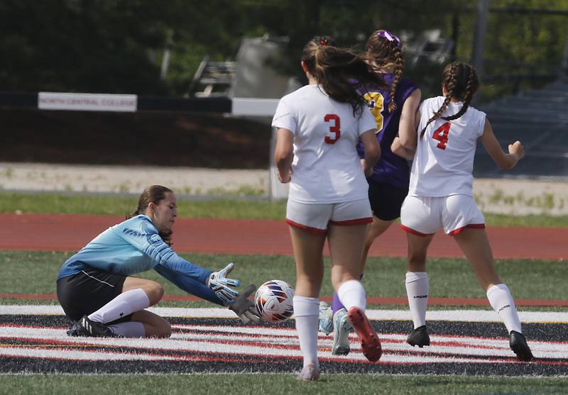 Timothy Christian's Emily White grabs the ball in the IHSA Class 1A State Girls Soccer third-place match against Williamsville on Friday, June 6, 2025, at North Central College in Naperville.