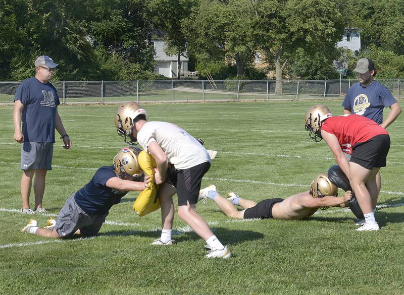 The Marquette Crusaders began their first practice Monday at the Gould Field complex with a variety of drills and workouts to prepare for the upcoming 2025 season.