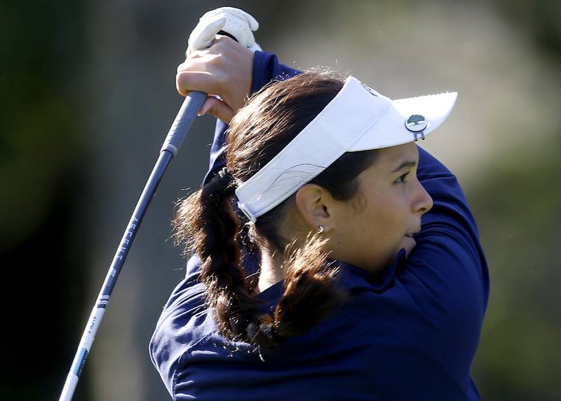 Sterling’s Toni Martinez watches her tee shot on the first hole during the IHSA Class 2A Huntley Girls Golf Regional on Tuesday, Oct. 1, 2024, at Pinecrest Golf Club in Huntley.