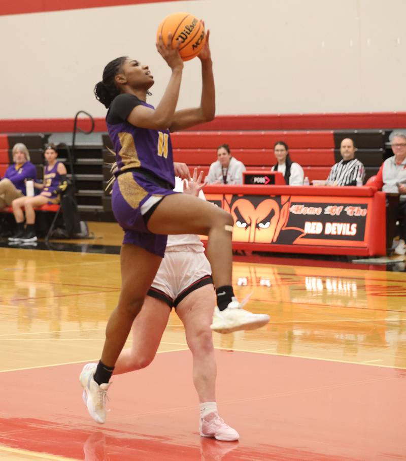 Mendota's Mariyah Elam scores on a layup against Hall on Monday, Dec. 1, 2025 at Hall High School.