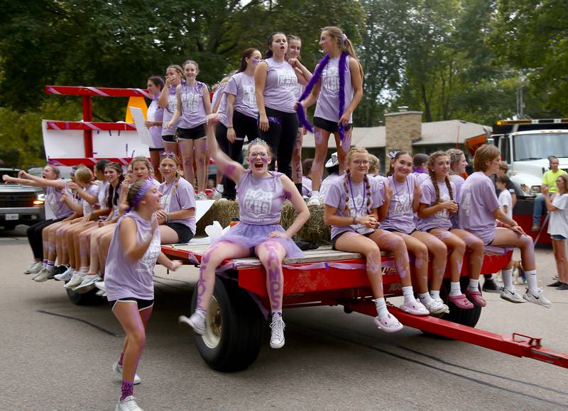 The Kaneland High School Senior Powder Puff Football players participate in the 2024 Kaneland Homecoming Parade in Sugar Grove on Wednesday, Oct. 4, 2024.