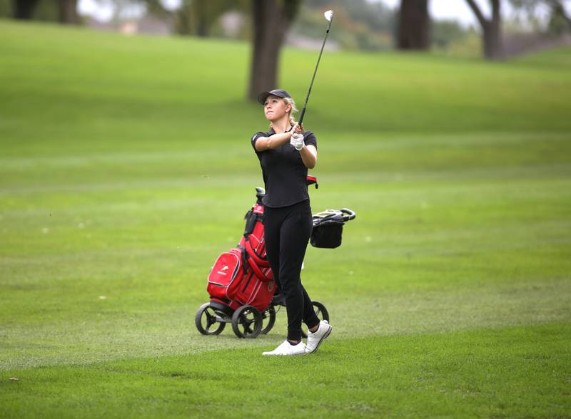 Benet’s Jenna Shilts hits from the fairway during the Class 2A Glenbard North Regional girls golf meet at Bloomingdale Golf Club on Thursday, Sept. 28, 2023.