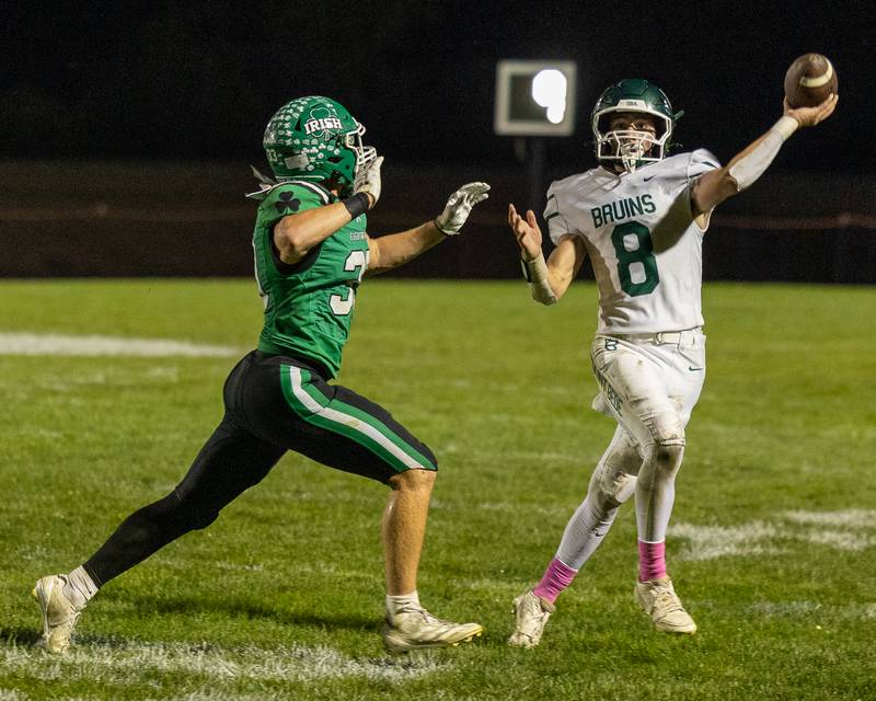 Quarterback Gino Ferrari (8) of St. Bede throws pass as Cam Shriey (33) of Seneca follows on Friday, Oct. 10, 2025 at Seneca High School in Seneca.