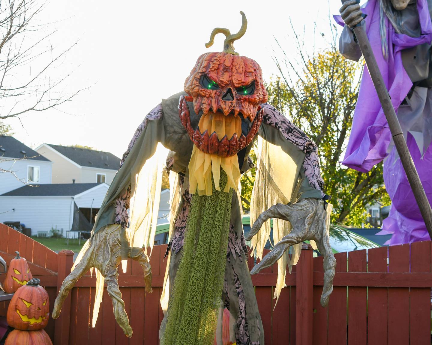 One of the many animatronic props that sit outside the back yard of Phil and Dannielle Dienoff is on display on Wednesday Oct. 16, 2024, at their home in Oswego.