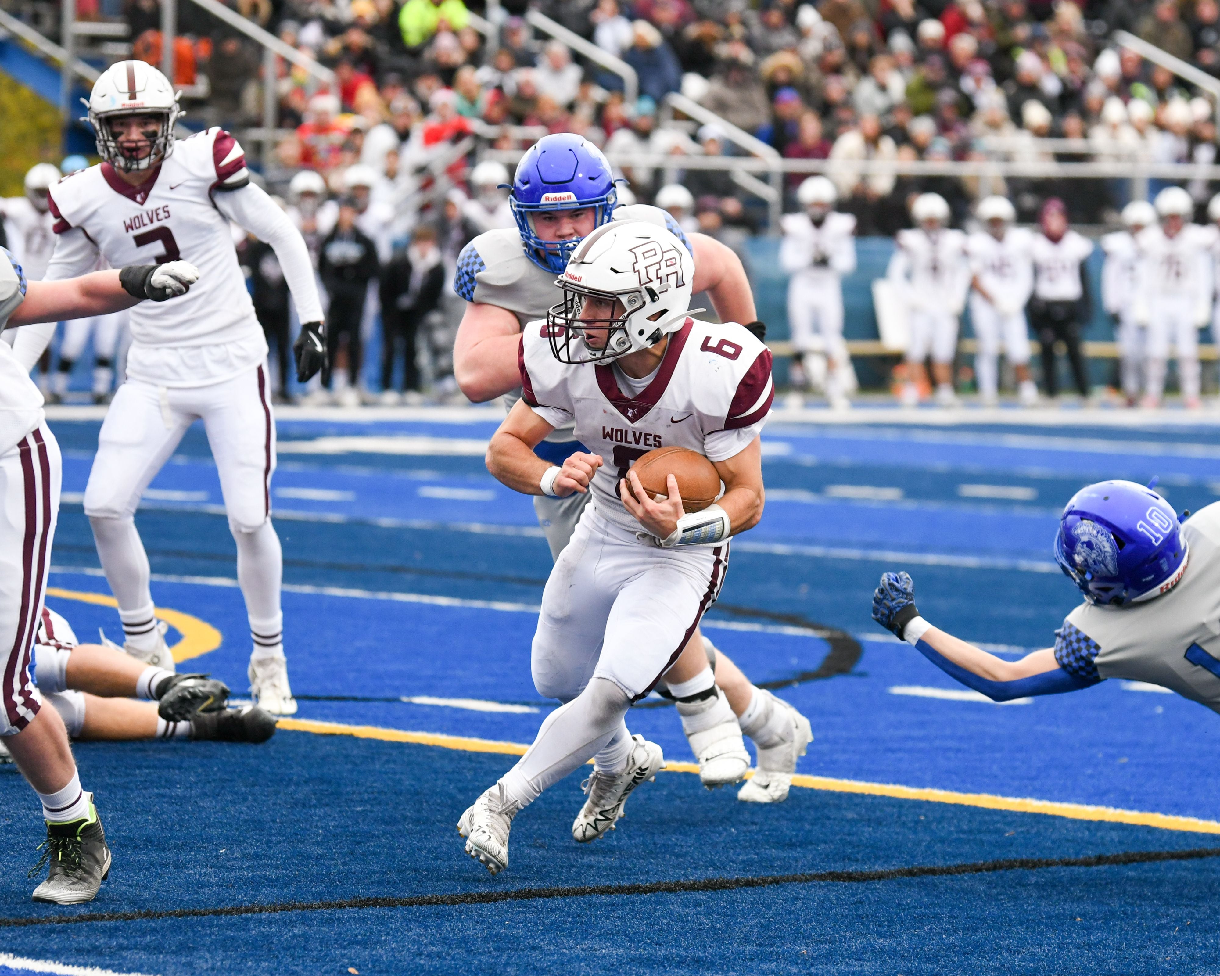 Prairie Ridge's Luke Vanderwiel (6) runs the ball in for a touchdown while taking on St. Francis during the second round of the 5A playoff game on Saturday Nov. 8, 2025, held at St. Francis's High School.