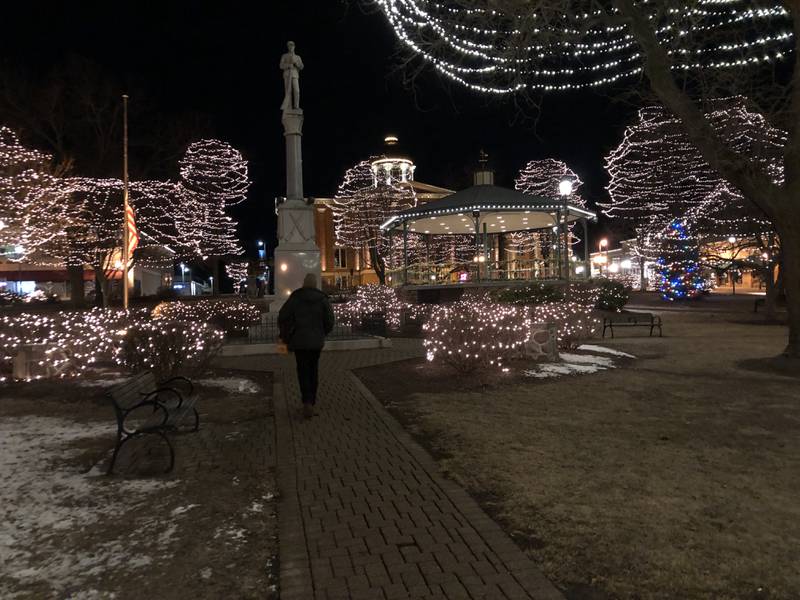 Andrew Turner did a quick check in Woodstock's historic square  in the early morning hours of Friday, Jan. 17, 2024, as part of the annual Point In Time count. The annual headcount is used for planning services to the county's unhoused residents.