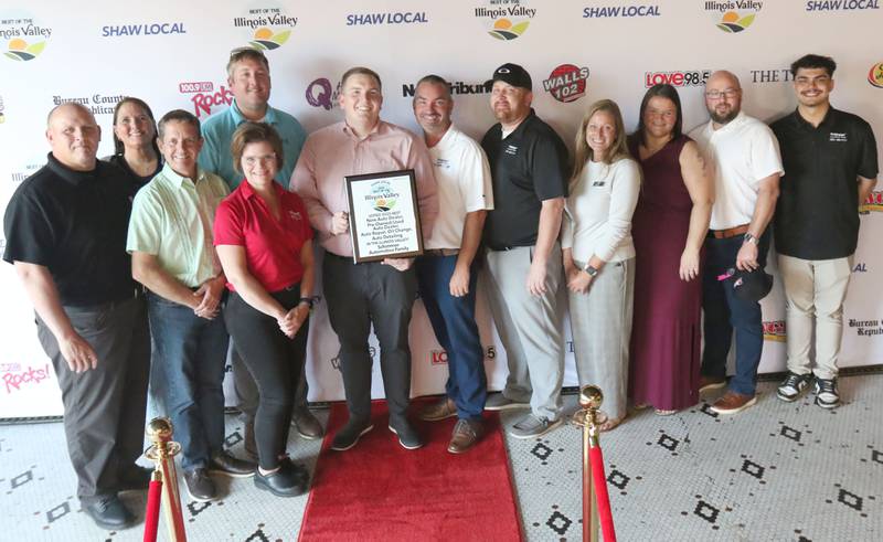 The staff of Shimmer Automotive pose for a photo during the second annual Best of the Illinois Valley event on Thursday at the Auditorium Ballroom in La Salle.