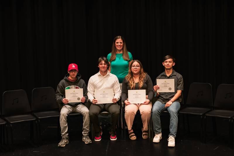Hall High School students that achieved the global seal of biliteracy in Spanish are (front, left to right) Cruz Martinez-Prado, Kyler Lapp, Maria Garcia, Yair Santiago, and (back row) instructor Katie Lawrence. Not pictured is Shechinah Ridley (not pictured).