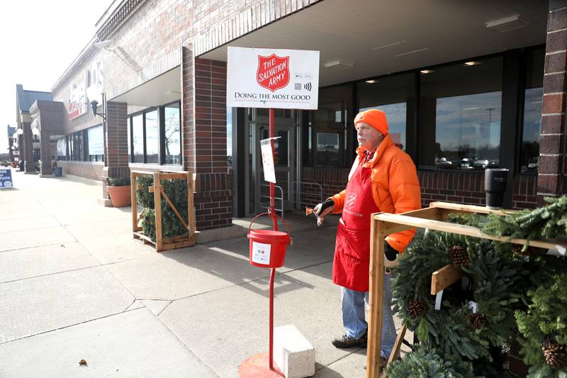Jeff Bowgren of St. Charles rings the bell for the Salvation Army outside the Jewel-Osco in Batavia. A coveted gold coin was recently discovered in the kettle at that location.