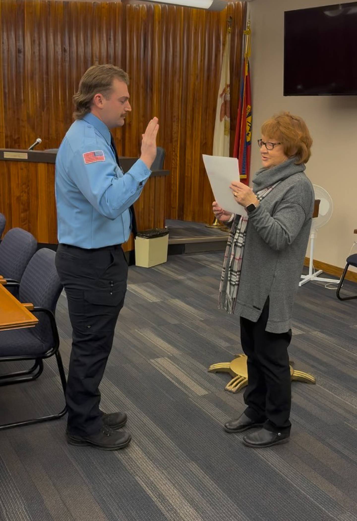 Chandler Bedeker is sworn in Monday, Feb. 16, by Streator City Clerk Patricia Henderson during a pinning ceremony at Streator City Hall.